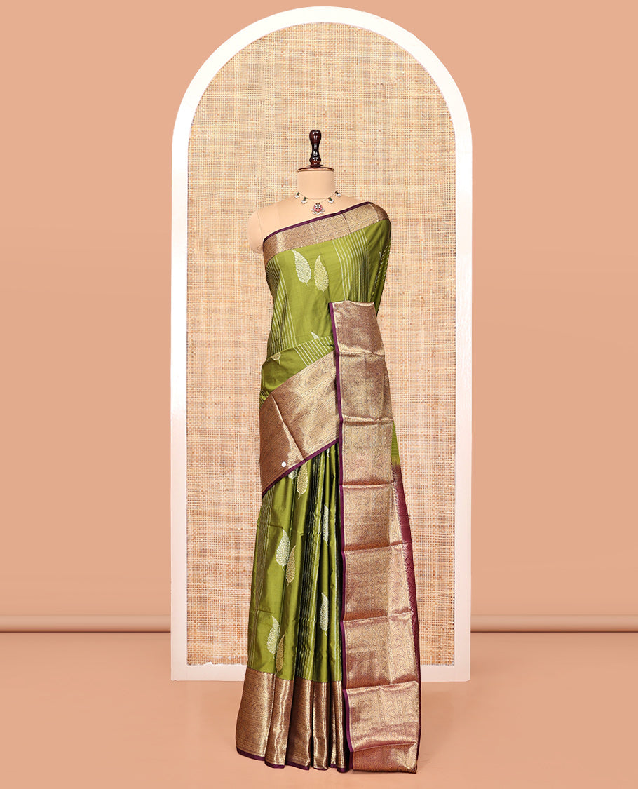 Green Budget Silk Saree, Enthralled with Zari Buttas and Stripes, Complemented by a Contrast Traditional Zari Border, Jaal Pallu, and a Contrast Blouse