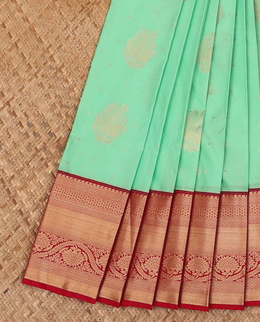 Green Budget Silk Saree Decorated with Zari Buttas, Complemented with a Contrast Traditional Zari Design Border, Zari Embellished Pallu of Intricate Designs, and Paired with a Contrast Blouse