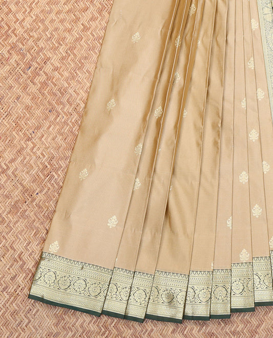 Champagne Color Budget Silk Saree, Graced with Zari Buttas All Over Its Body, Complemented by a Contrast Traditional Zari Design Border, Pallu of Paisley Butta Enclosed Jaal Designs, and Paired with a Contrast Blouse