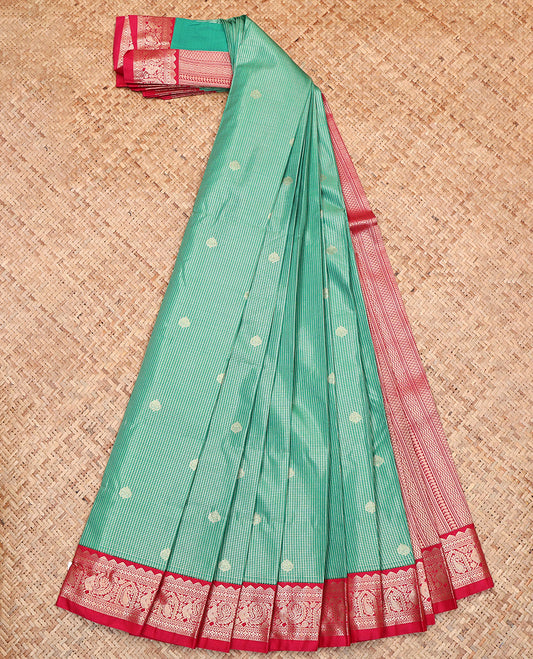 Green Budget Silk Saree, Ornamented with Zari Buttas and Micro-Checks, Complemented by a Contrast Traditional Zari Border, Geometric-Patterned Pallu, and a Contrast Blouse