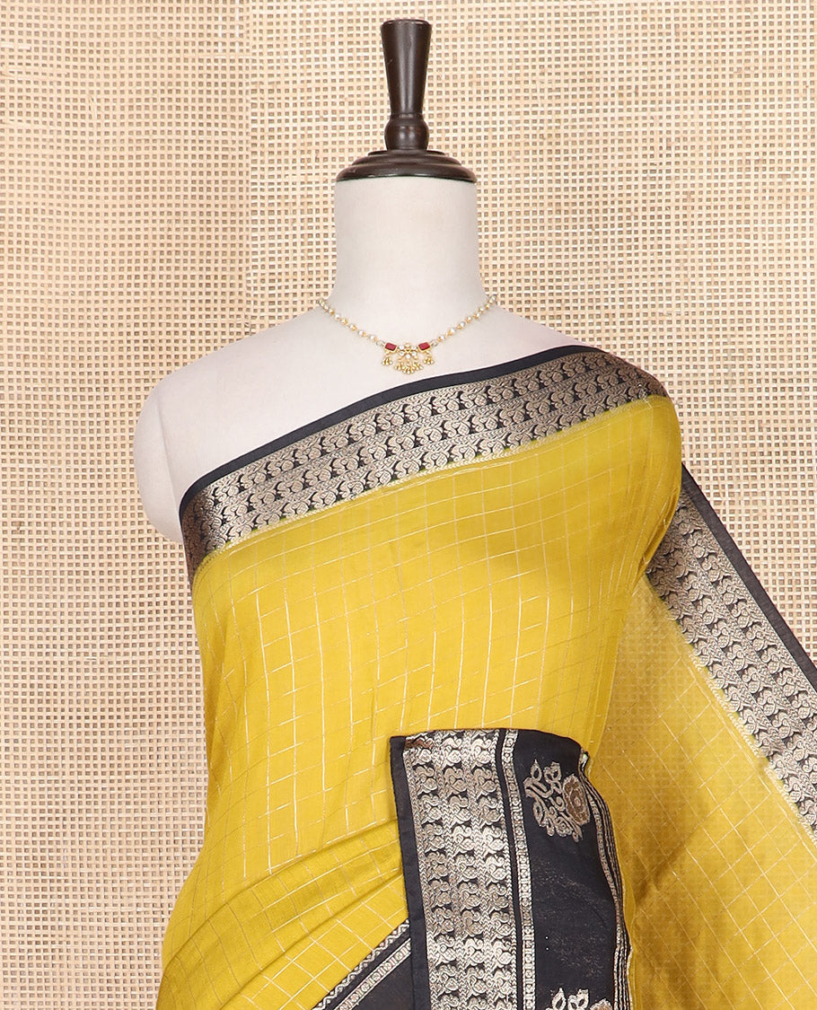 Yellow zari checked Assam silk saree, contrast traditional zari border of peacock and floral designs, and pallu of zari stripes