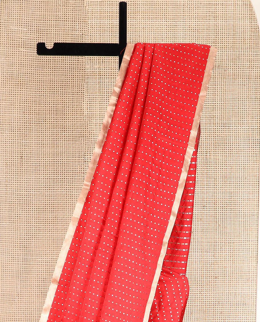 Dazzling red dobbly style dotted banarasi silk saree, piping zari border, and chevron striped pallu