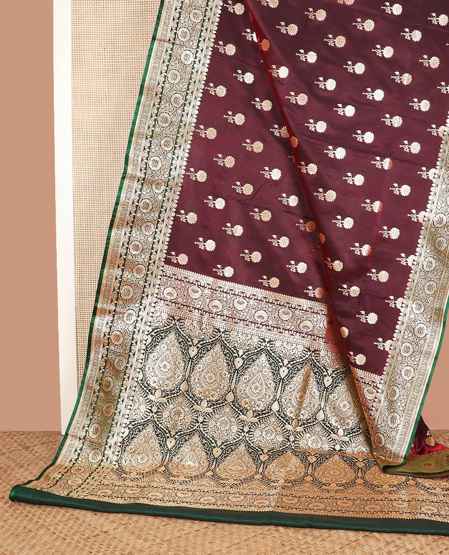 Maroon floral buttas banarasi silk saree, contrast floral creeper design border, and Mughal-style designs woven pallu