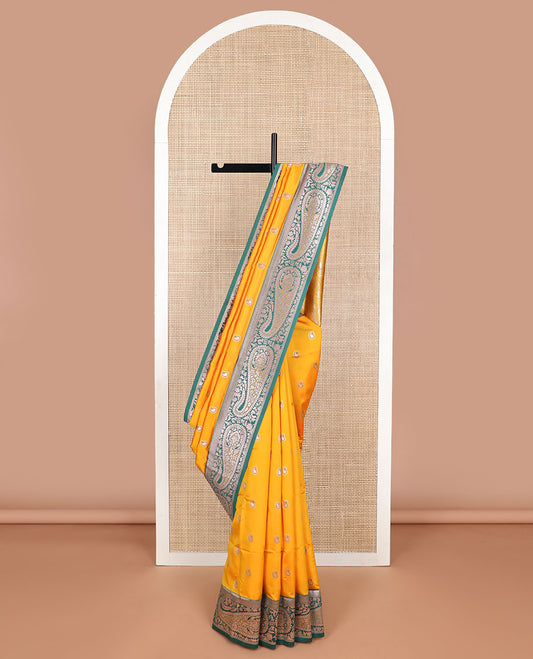 Orange paisley design butter silk saree with contrast paisley zari design border & floral design pallu