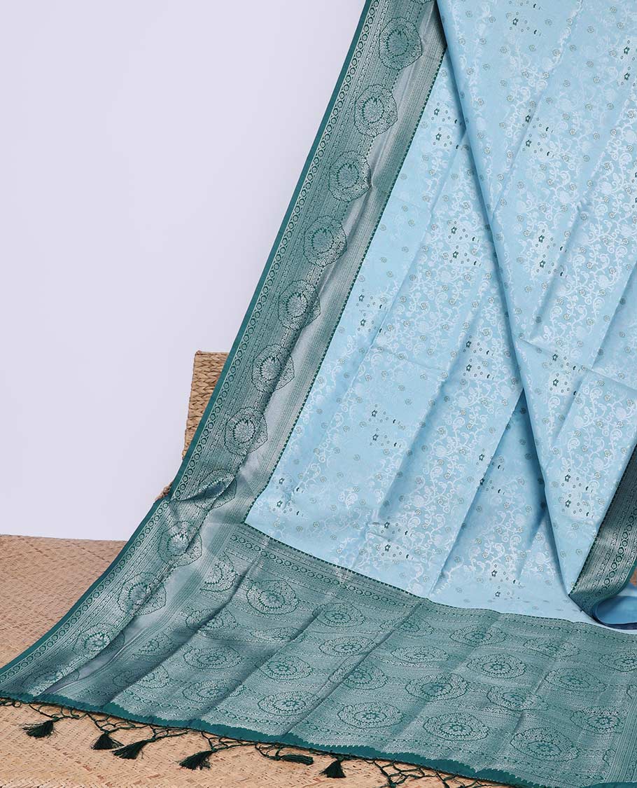 Green floral butter silk saree with contrast floral design border & pallu of floral jaal design