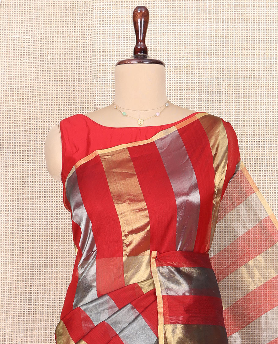Borderless Red Chanderi Cotton Saree, Gleaming with Zari Stripes All Over Its Body, Highlighted by Pallu Steeped with Zari Stripes, and Paired with a Matching Blouse