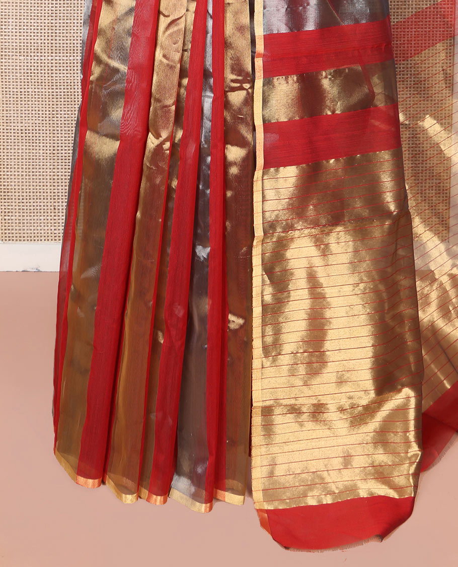 Borderless Red Chanderi Cotton Saree, Gleaming with Zari Stripes All Over Its Body, Highlighted by Pallu Steeped with Zari Stripes, and Paired with a Matching Blouse