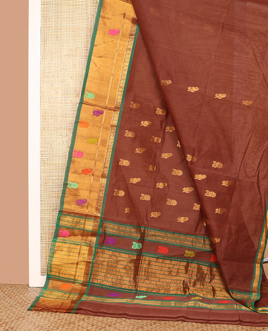 Brown Venkatagiri Cotton Saree, Decked Up with Zari Buttas on Its Body, Complemented by a Contrast Border of Zari and Thread Designs, Gleaming Pallu, and Comes Without a Blouse