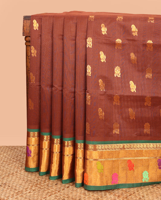 Brown Venkatagiri Cotton Saree, Decked Up with Zari Buttas on Its Body, Complemented by a Contrast Border of Zari and Thread Designs, Gleaming Pallu, and Comes Without a Blouse