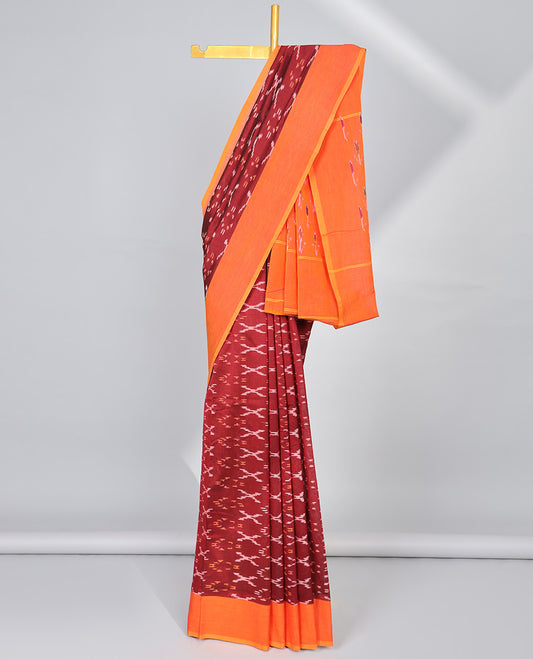 Maroon geometric ikkat cotton saree with contrast plain border & striped, floral design pallu