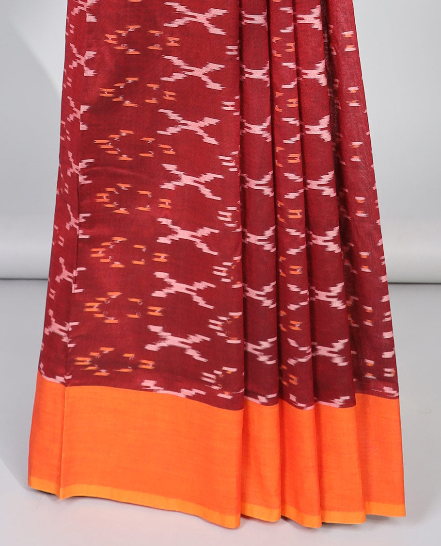 Maroon geometric ikkat cotton saree with contrast plain border & striped, floral design pallu