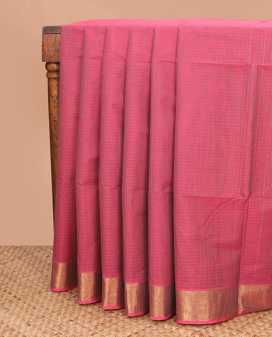 Pale pink plain jute cotton saree, zari border, and striped pallu