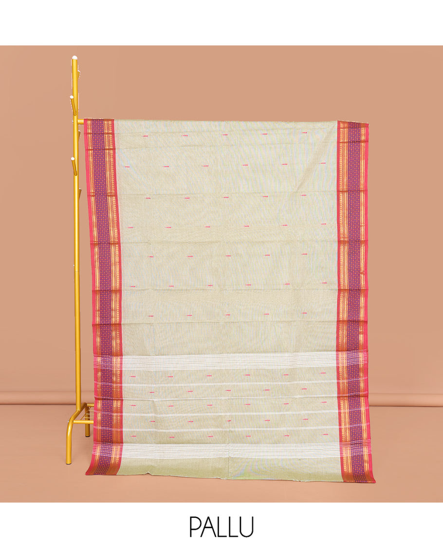 Pale Green Chettinad Cotton Saree, Featuring Buttas All Over Its Body, Complemented by Contrast Traditional Zari Border, Pallu of Stripes, and Paired with a Matching Blouse