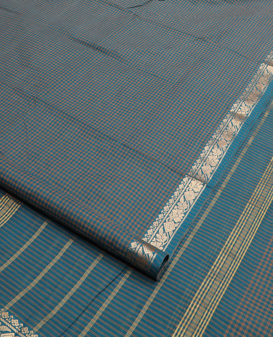 Blue micro-checked nine-yard cotton saree, traditional motif border, and striped pallu