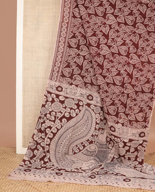 Maroon leaf machine printed kalamkari cotton saree, floral printed border, and pallu of peacock print