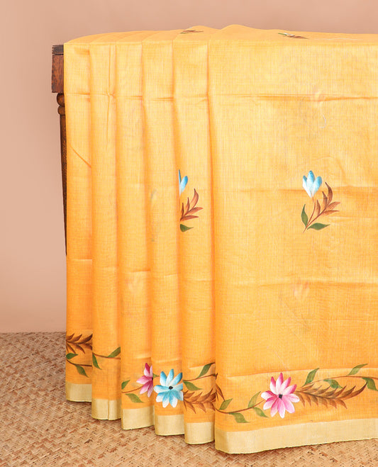 Orange hand brush painting style floral printed chirala cotton saree, plain border, and contrast floral printed pallu