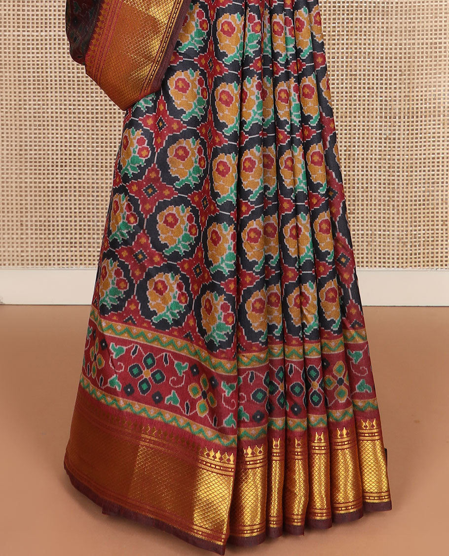 Black ikkat design semi-banaras patola silk saree, traditional zari design border, and ikkat design pallu