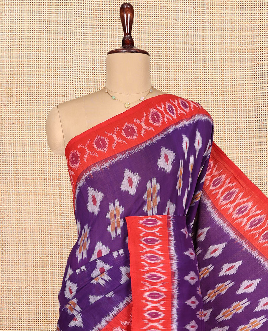 Violet Ikkat Cotton Saree, Showcasing Ikkat Buttas All Over Its Body, Complemented by a Contrast Ikkat-Style Border, Chevron Striped Pallu, and Paired with a Contrast Blouse