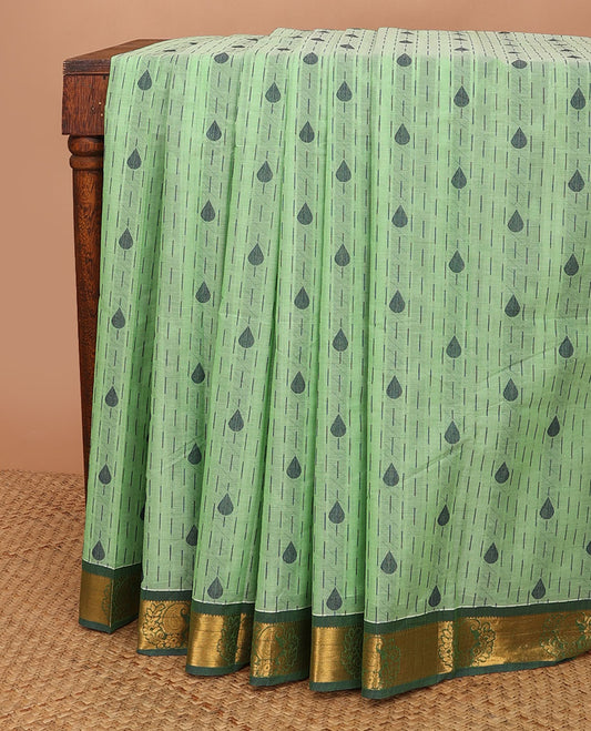 Green buttas kanchi cotton saree, contrast zari paisley border & pallu steeped with paisley motifs