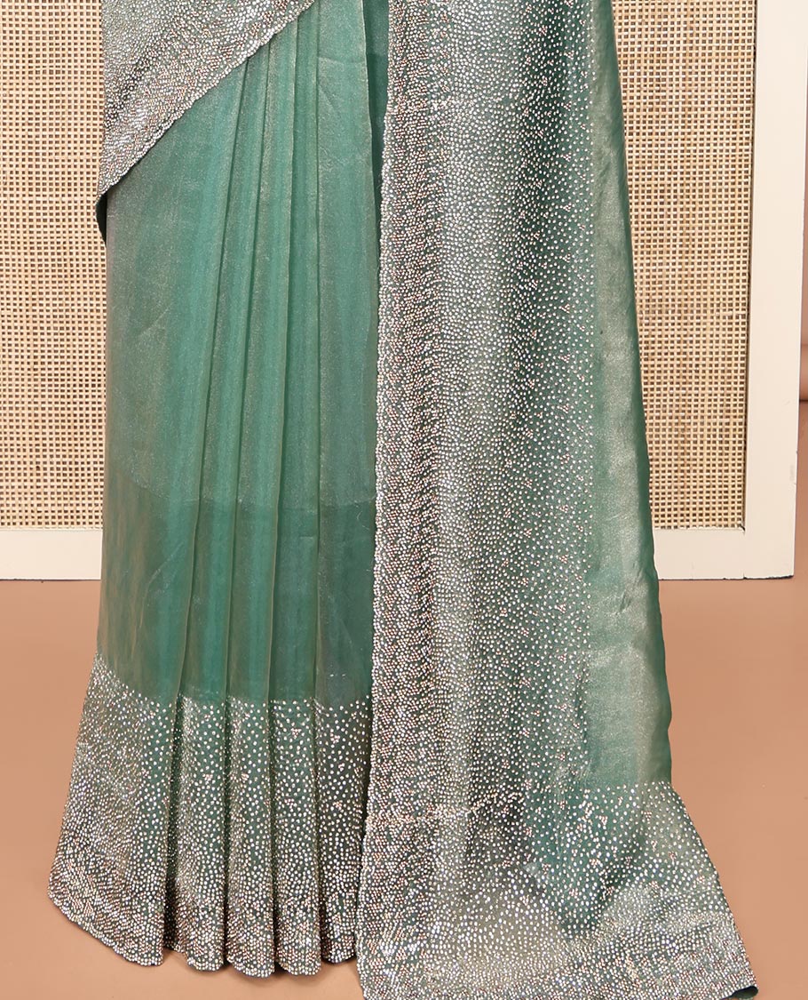 Emerald Green Fendi Silk Saree with Swarovski Stonework Border, and a Stonework Blouse