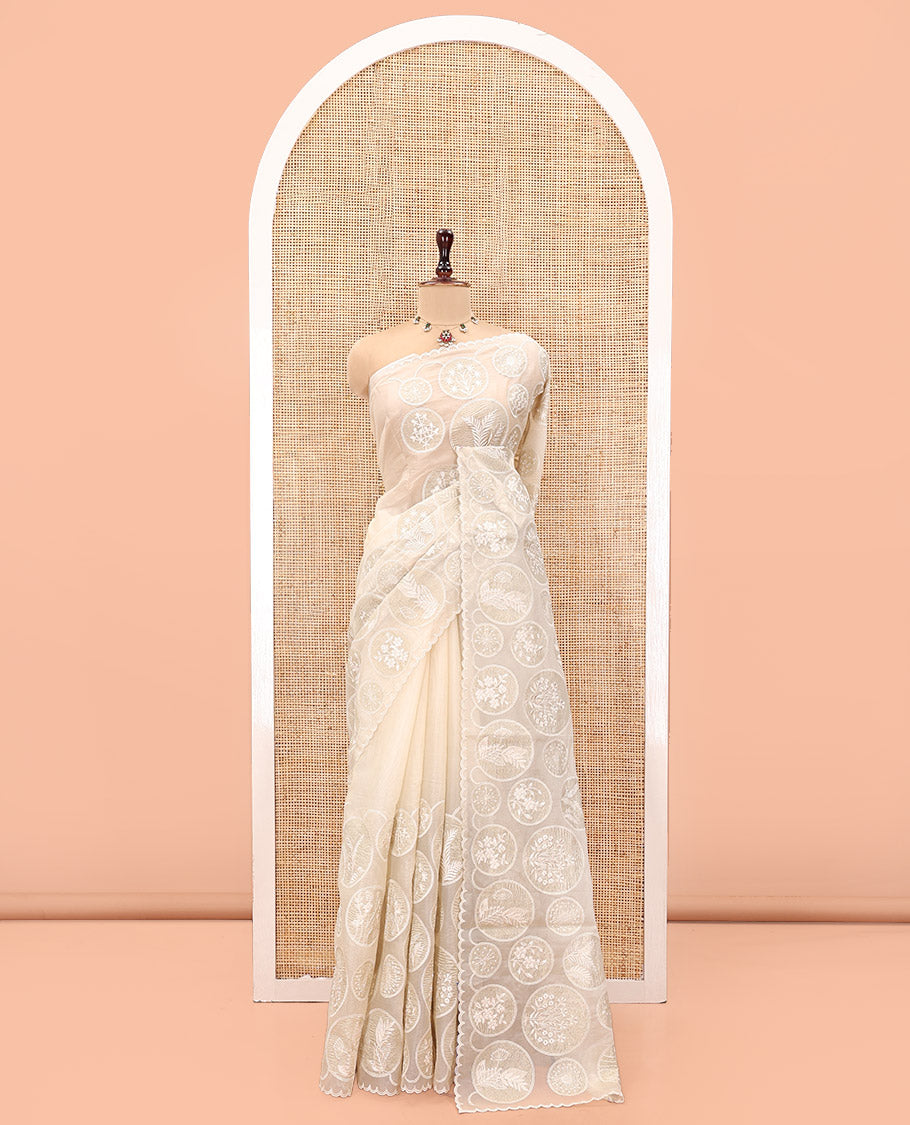 Off-White Organza Saree, Delicately decked Up with Floral Enclosed Circle Motifs Thread Embroidery, Subtle Scallop Border, Delicately Embroidered Pallu, and Paired with a Matching Embroidered Blouse