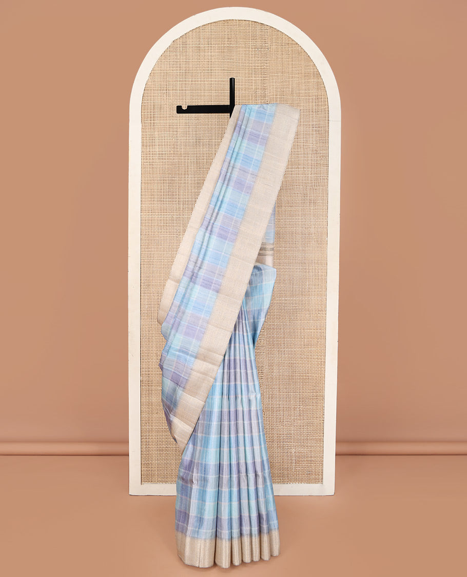 Blue Fancy Tussar Saree, Mesmerized with Checked Designs Printed on Its Body, Complemented by Contrast Textured Border, Patola Printed Pallu, and Paired with a Matching Printed Blouse