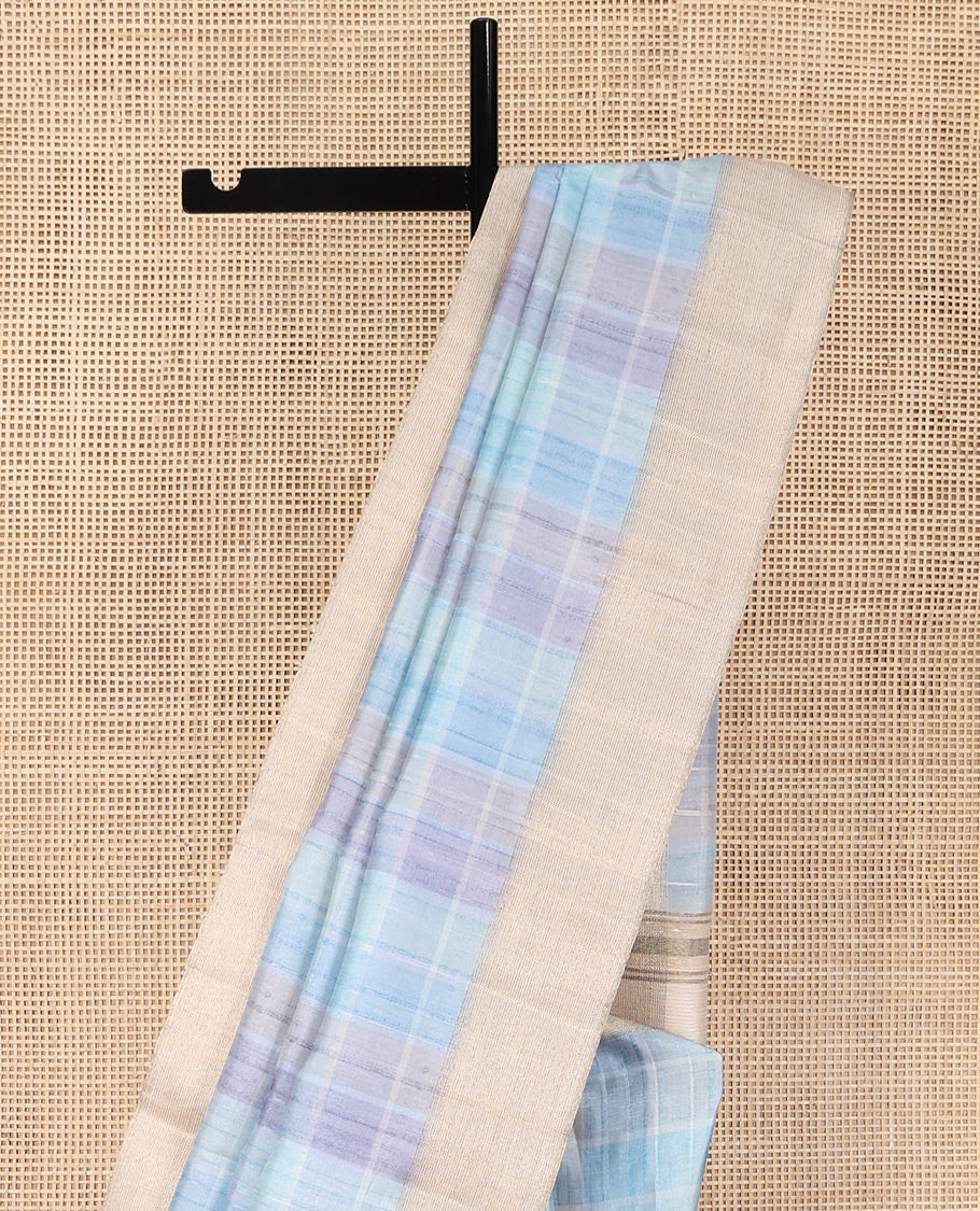 Blue Fancy Tussar Saree, Mesmerized with Checked Designs Printed on Its Body, Complemented by Contrast Textured Border, Patola Printed Pallu, and Paired with a Matching Printed Blouse