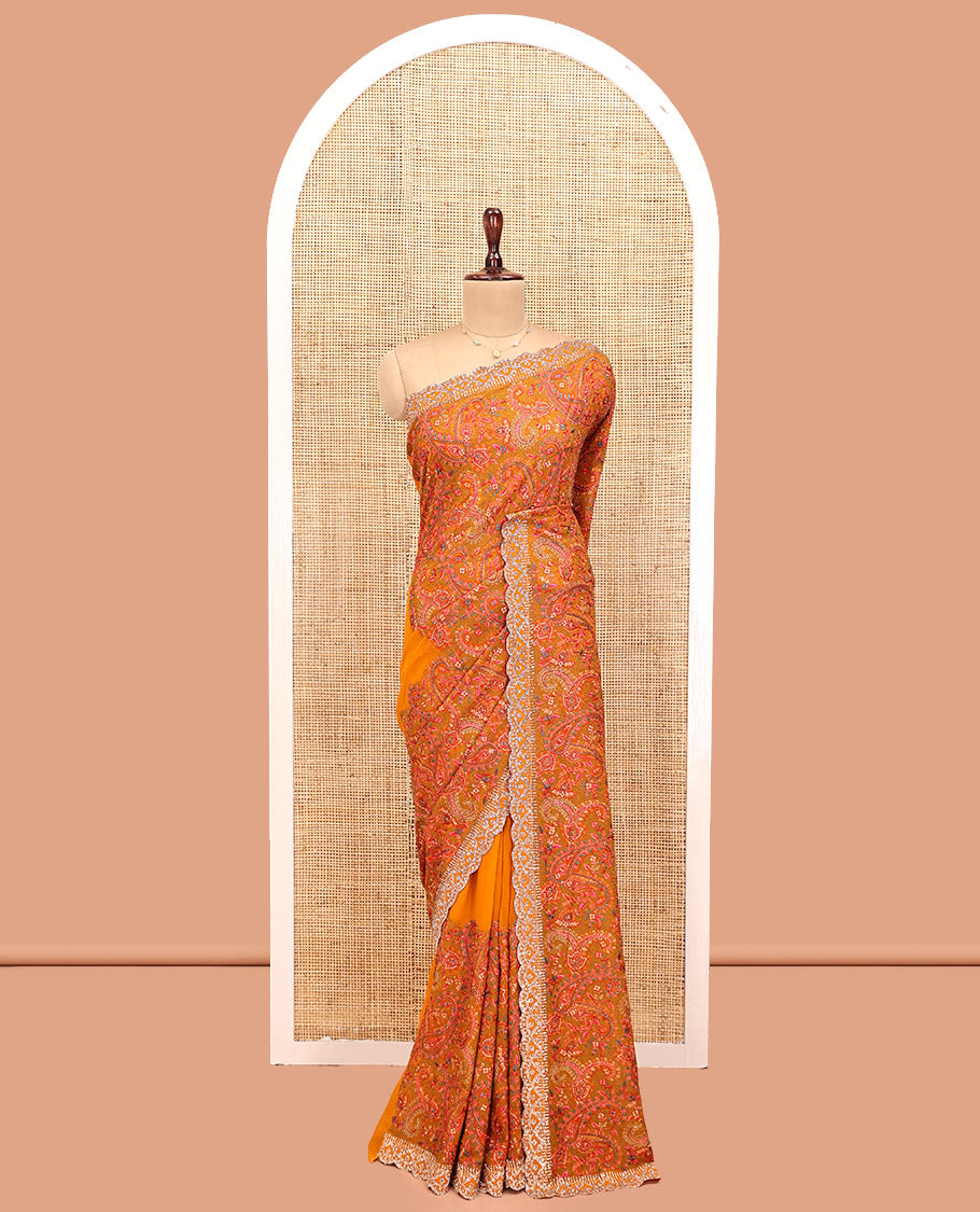 Orange Designer Saree, Richly Detailed with Paisley Mixed Embroidery, a Scallop Stone Work Border, and a Matching Blouse