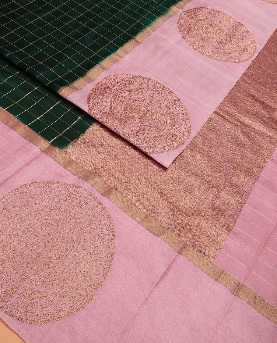 Green Raw Mango Silk Saree Decked Up with Checks, Features a Contrast Chakram Motifs Border, a Zari-Elevated Pallu, and Paired with a Contrast Blouse
