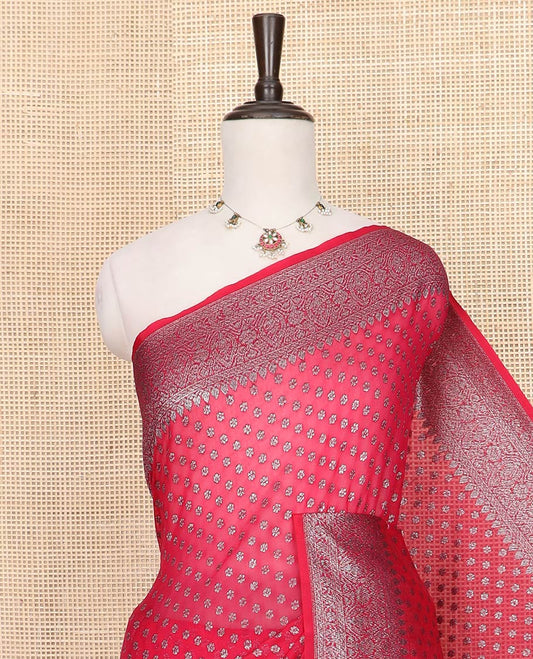 Red Fancy Georgette Saree Mesmerized with Zari Buttas, Highlighted by a Traditional Zari Design Border, Grandly Woven Pallu Featuring Floral Zari Designs, and Paired with a Matching Blouse