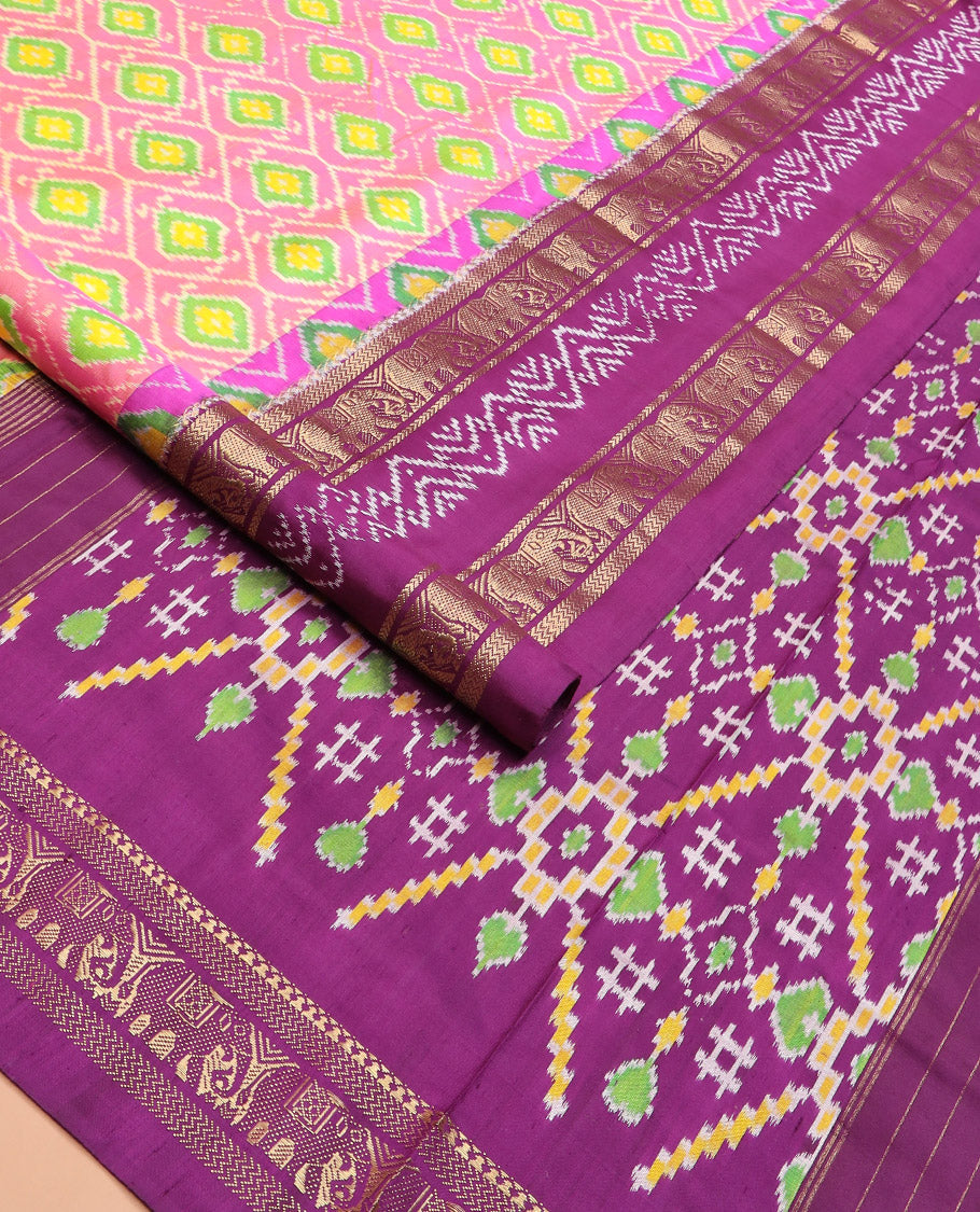 Candy Pink Ikkat Silk Saree Adorned with Ogee Patterns, Complemented by a Contrasting Elephant Zari Border, a Hazily Woven Pallu of Intricate Patterns, and a Contrasting Blouse