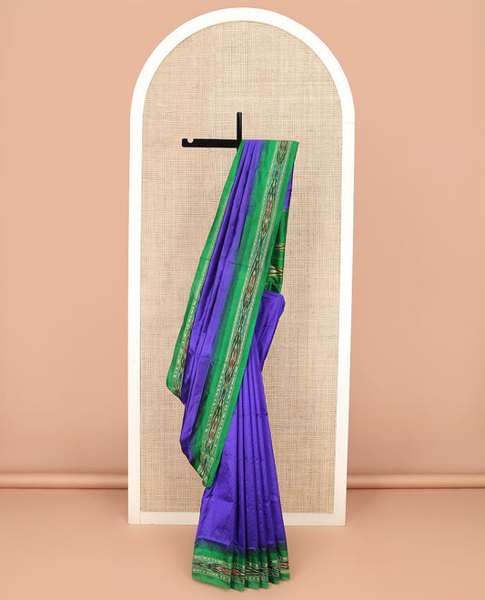Violet Plain Ikkat Silk Saree with a Contrast Green Border Adorned by a Hazy Ikkat Weave, Featuring a Pallu Flanked by Stripes and Ikkat Texture