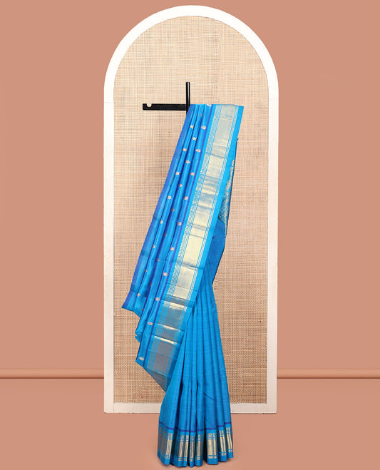 Blue Kanchipuram Silk Saree, Detailed with Zari Buttas, a One-Sided Border Featuring Panner Sombu, Banaras, and Jaal Design, Pallu of Kodi Visiry, and No Blouse