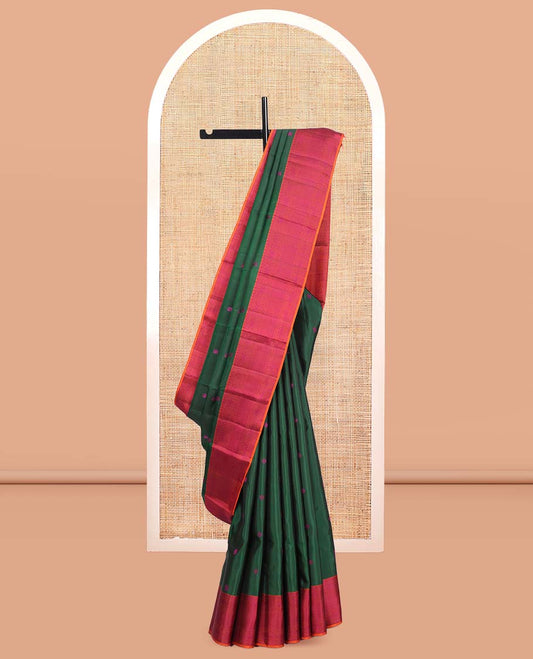 Green Kanchipuram Silk Saree, Beautified with Thread Buttas, a Contrast Border of Thilakam Mokku, Iruthalai Pakshi, and Kuyil Kann, Jaal Pallu, and a Contrast Blouse