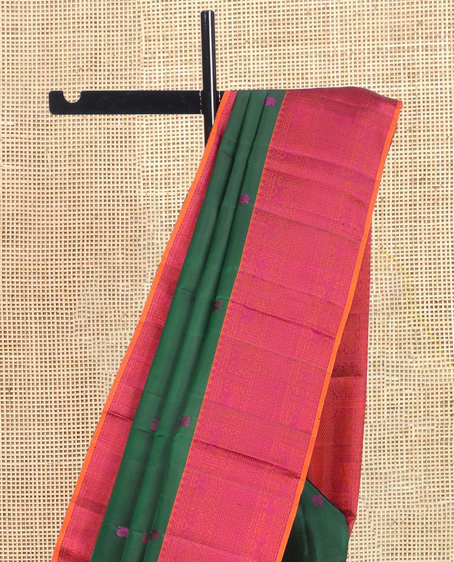Green Kanchipuram Silk Saree, Beautified with Thread Buttas, a Contrast Border of Thilakam Mokku, Iruthalai Pakshi, and Kuyil Kann, Jaal Pallu, and a Contrast Blouse
