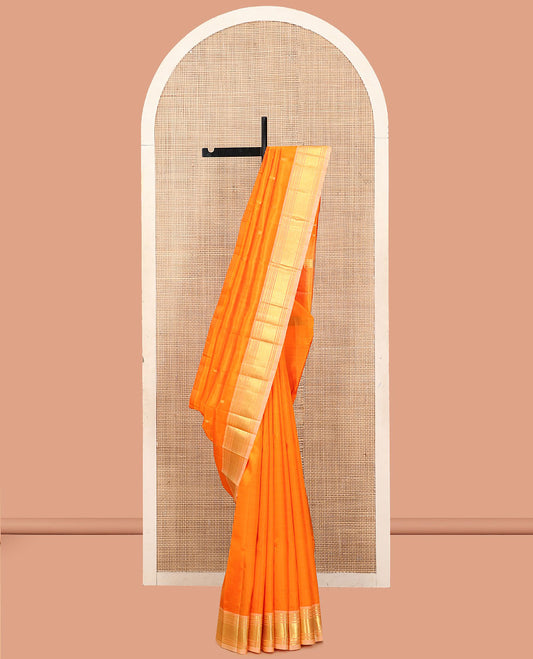 Orange Kanchipuram Silk Saree, Finely Crafted with Zari Buttas, a Contrast One-Sided Border of Paneer Sombu, Banaras, Muthu, and Mayil Kann Designs, a Zari Design Pallu, and No Blouse