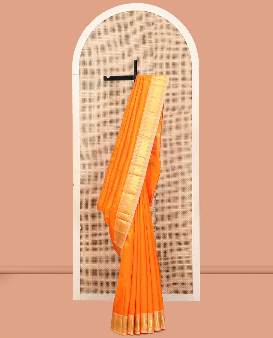 Orange Kanchipuram Silk Saree, Finely Crafted with Zari Buttas, a Contrast One-Sided Border of Paneer Sombu, Banaras, Muthu, and Mayil Kann Designs, a Zari Design Pallu, and No Blouse