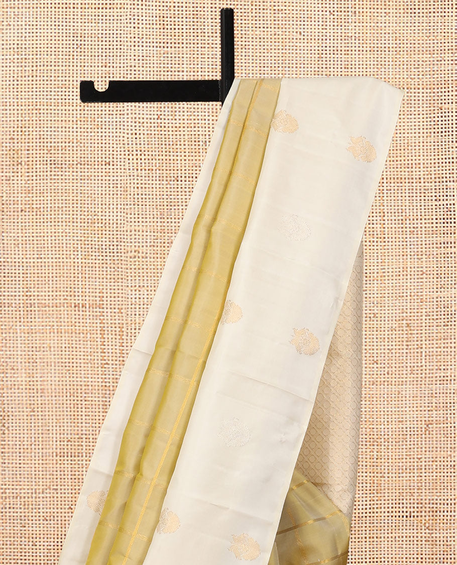 Gold Kanchipuram Silk Saree, Enriched with Zari Checks, a Contrast Zari Border, Grand Jaal Pallu, and a Contrast Blouse