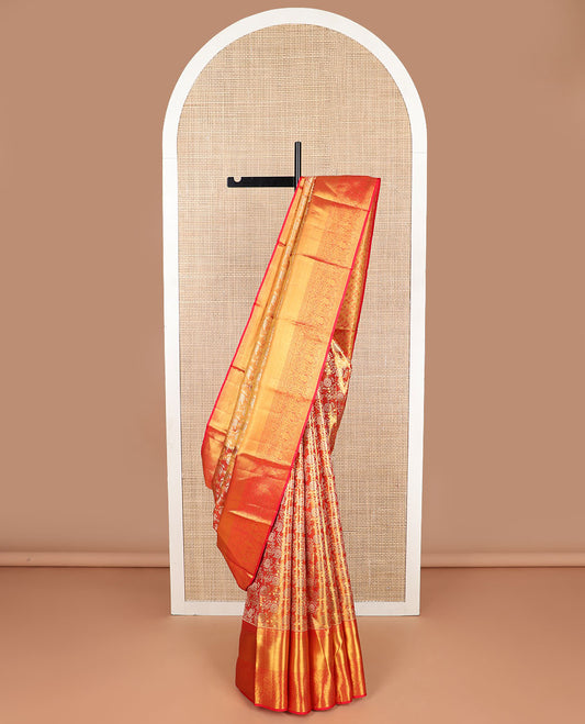 Orange floral jacquard kancheepuram tissue silk saree  with contrast border of thilakam mokku, muthu, kuyil kann, kodi visiry design & zari design pallu