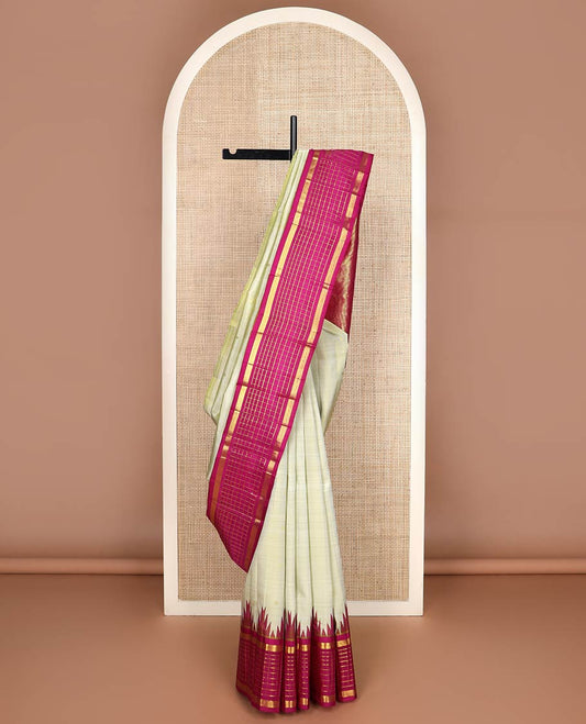 Green zari buttas kanchipuram silk saree, contrast one-sided thazampoo rekku muthu kattam zari border & pillaiyar mokku pallu