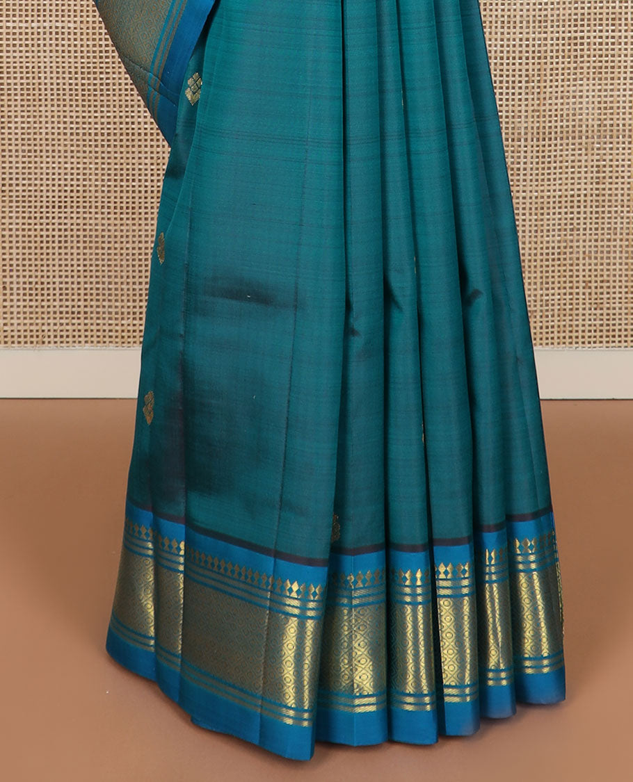 Blue zari buttas Kanchipuram silk saree, contrast border of paneer sombu, banaras & mayil kann & zari design pallu