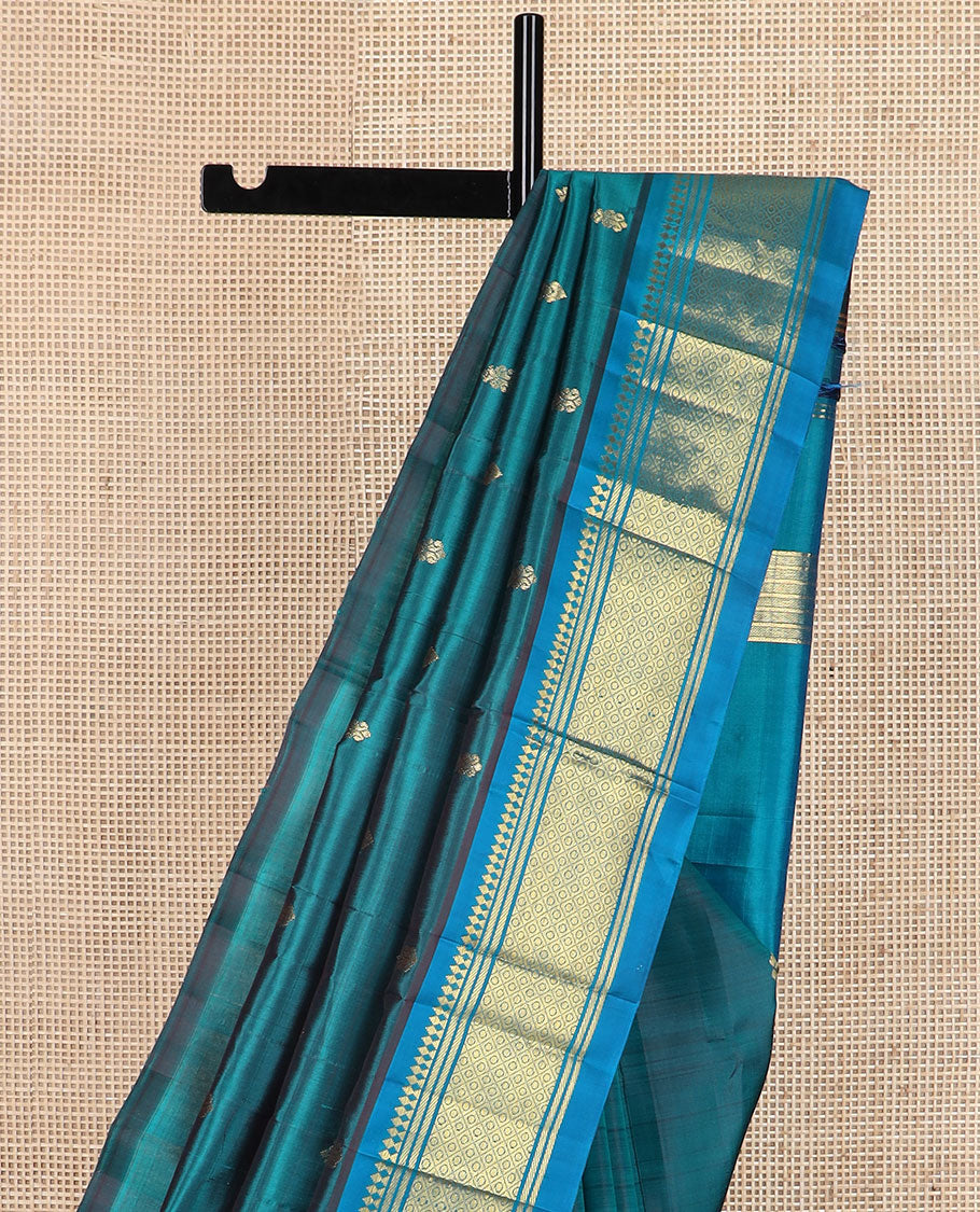 Blue zari buttas Kanchipuram silk saree, contrast border of paneer sombu, banaras & mayil kann & zari design pallu