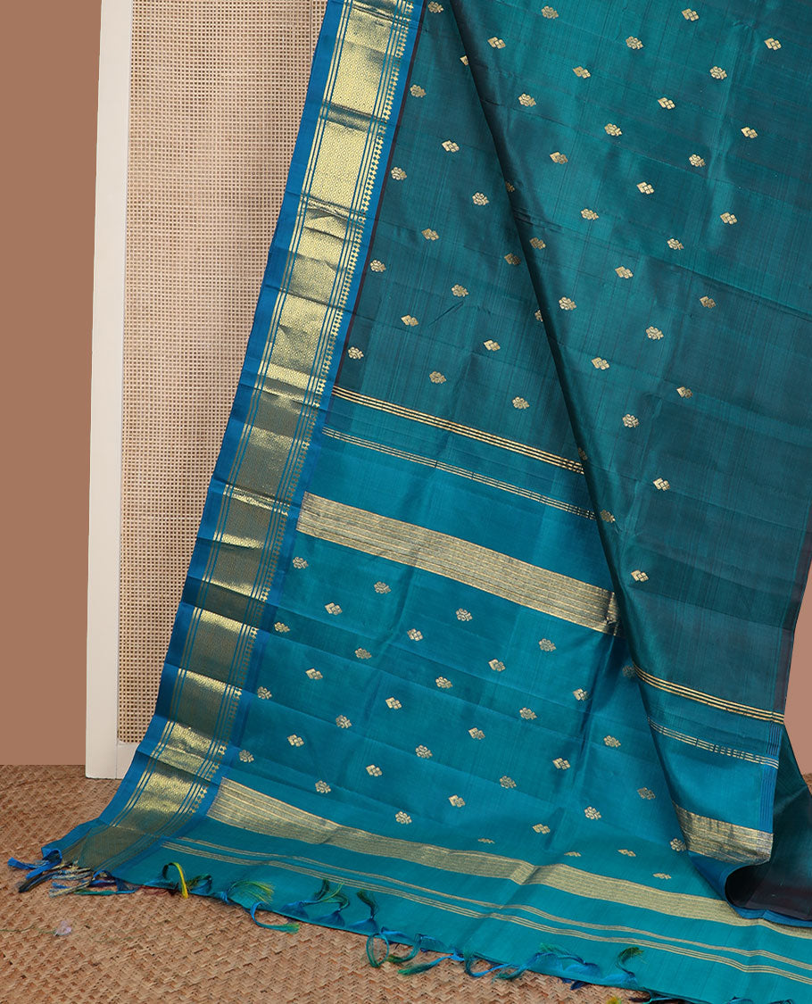 Blue zari buttas Kanchipuram silk saree, contrast border of paneer sombu, banaras & mayil kann & zari design pallu