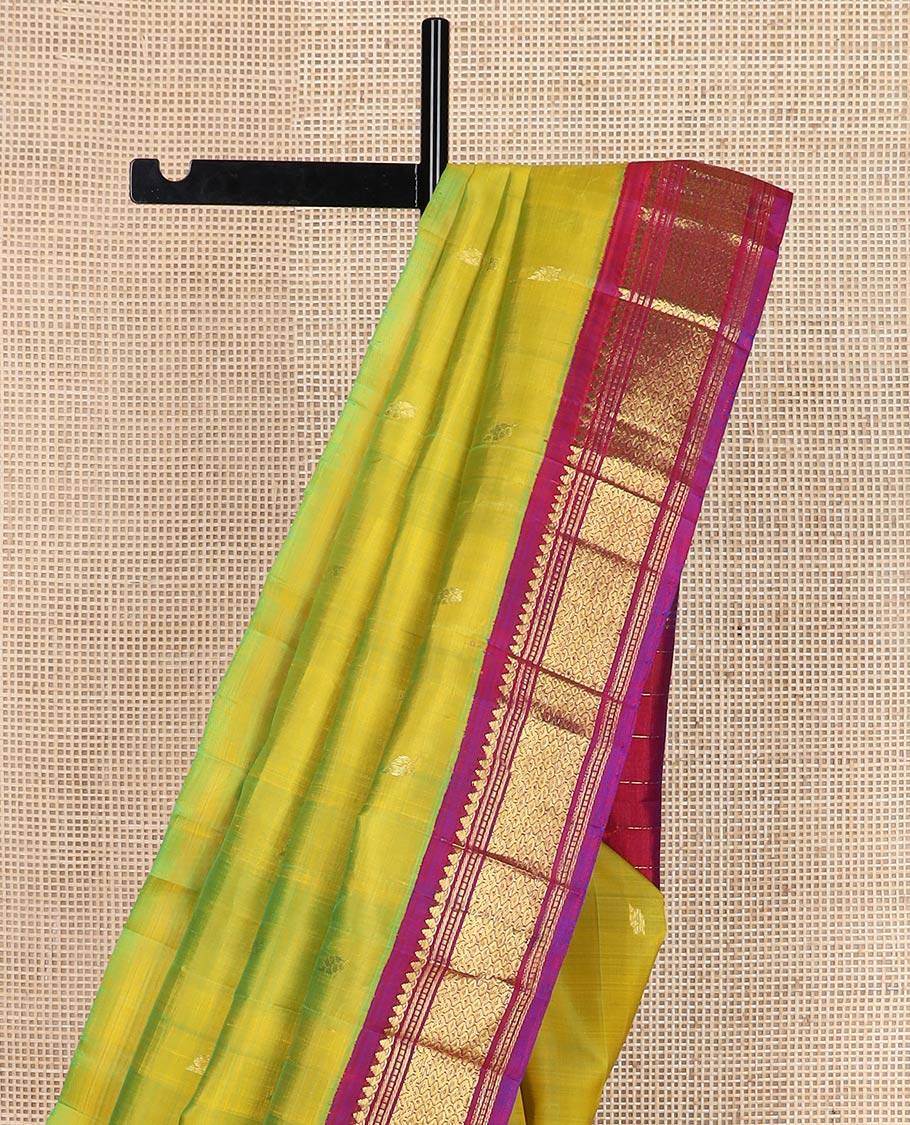 Green zari buttas silk saree, contrast one-sided border of thilakam mokku,banaras,muthu & then kuli kann & zari design pallu