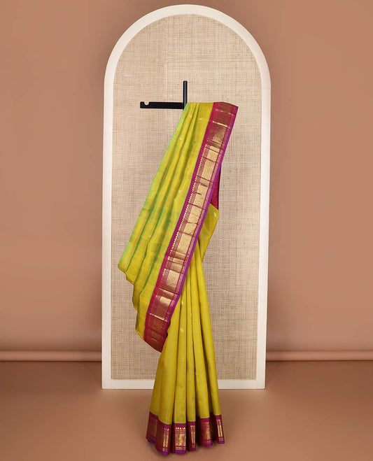 Green zari buttas silk saree, contrast one-sided border of thilakam mokku,banaras,muthu & then kuli kann & zari design pallu