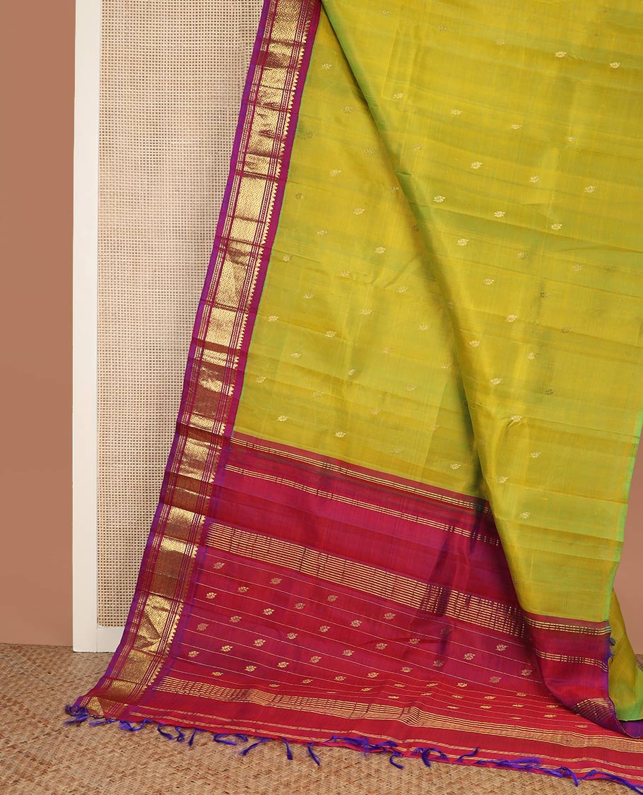Green zari buttas silk saree, contrast one-sided border of thilakam mokku,banaras,muthu & then kuli kann & zari design pallu