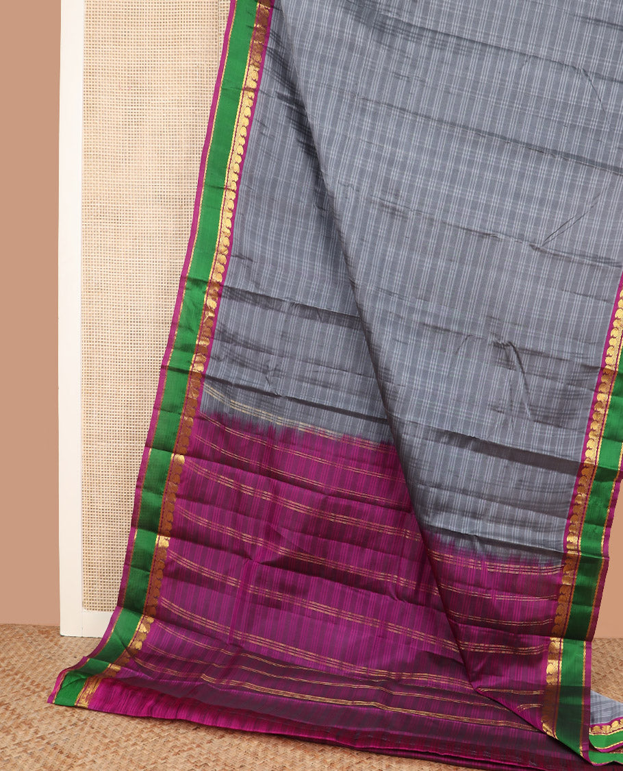 Grey striped Kanchipuram silk saree, contrast rettai pettu zari design border, and zari striped pallu