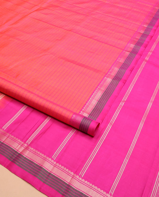 Pink striped Kanchipuram silk saree, contrast border of salngai, banaras, and kuyil kann designs, and zari striped pallu