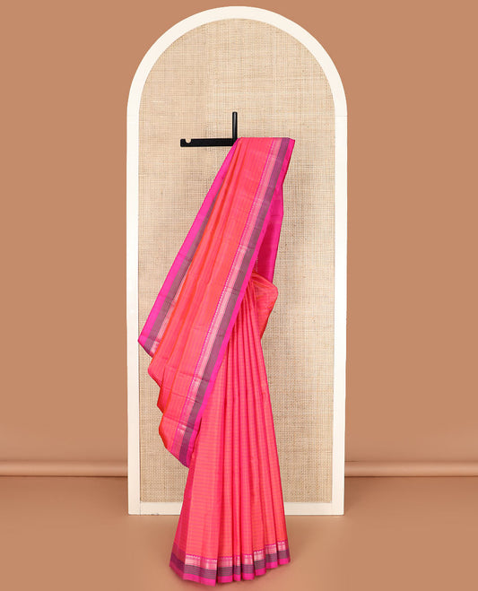 Pink striped Kanchipuram silk saree, contrast border of salngai, banaras, and kuyil kann designs, and zari striped pallu