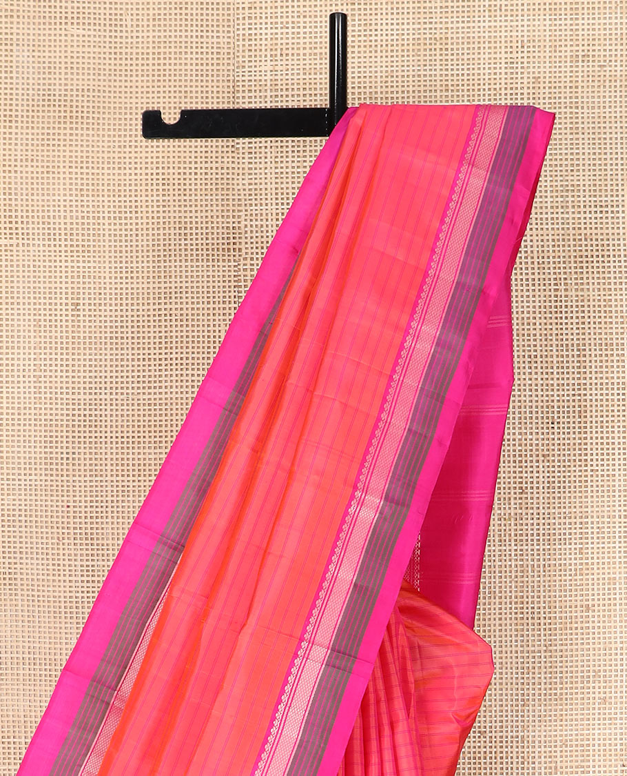 Pink striped Kanchipuram silk saree, contrast border of salngai, banaras, and kuyil kann designs, and zari striped pallu